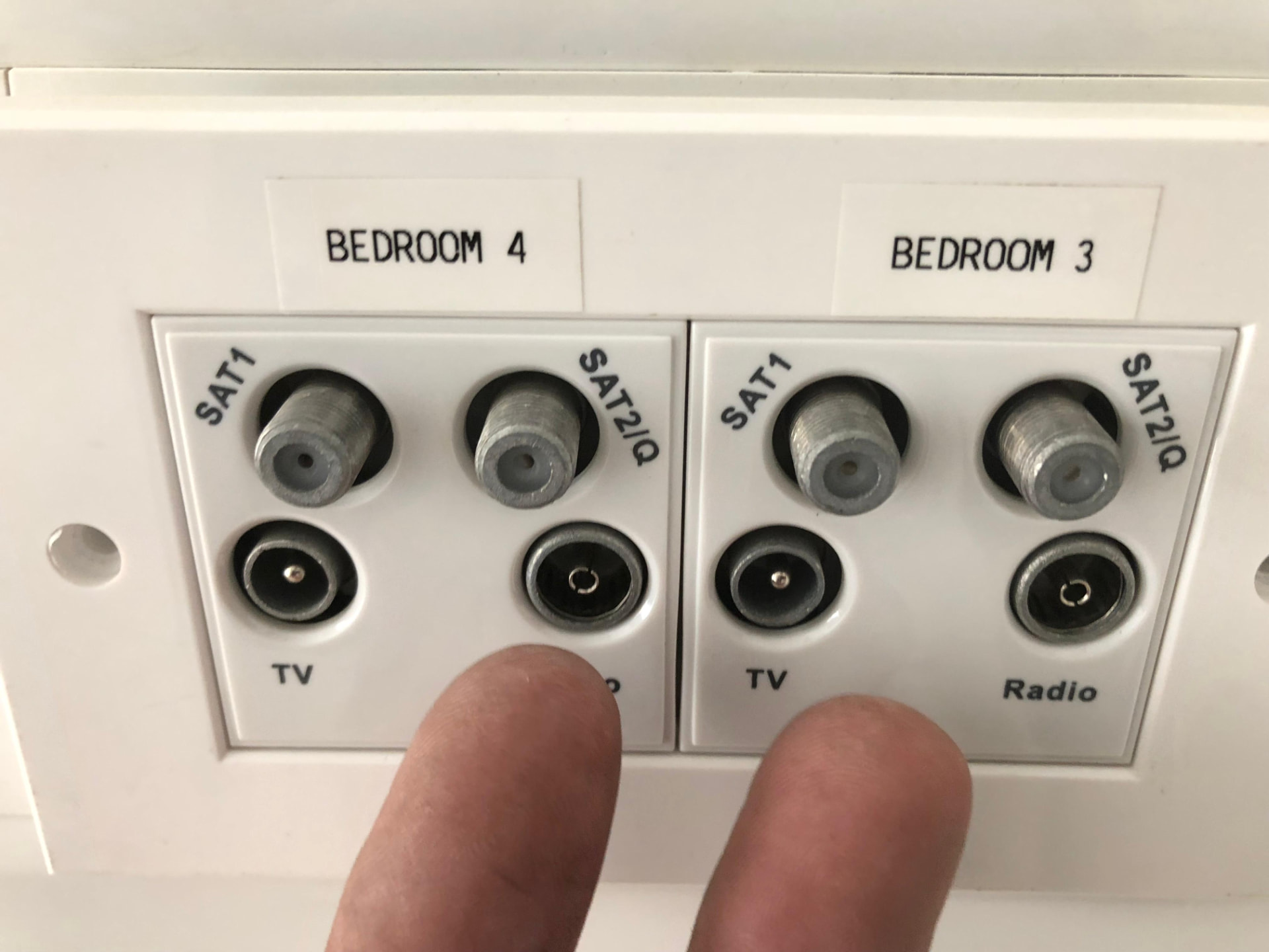 Labelled multi-room data point faceplate with satellite and TV feeds