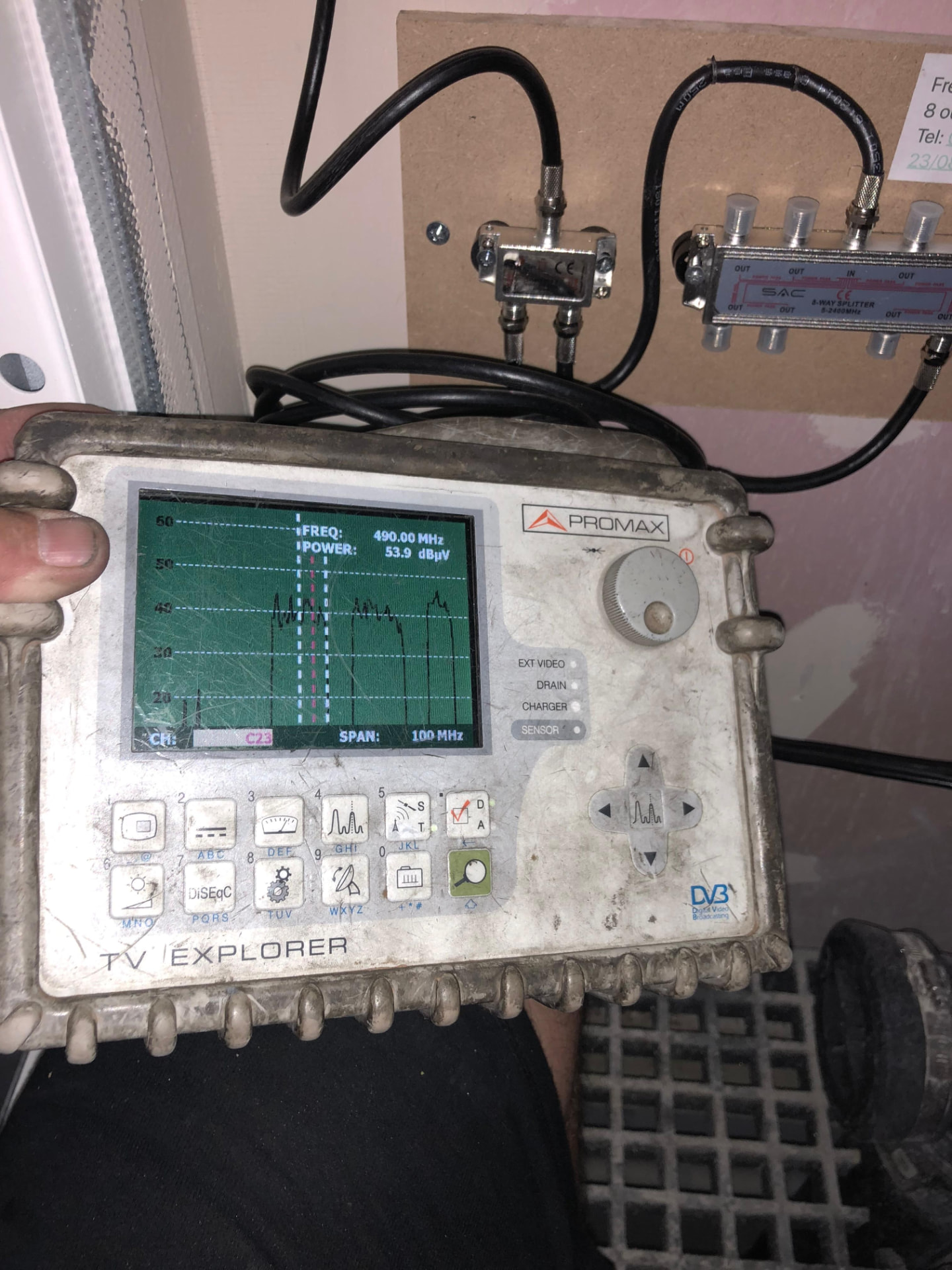 Promax TV Explorer signal meter reading the digital broadcast spectrum